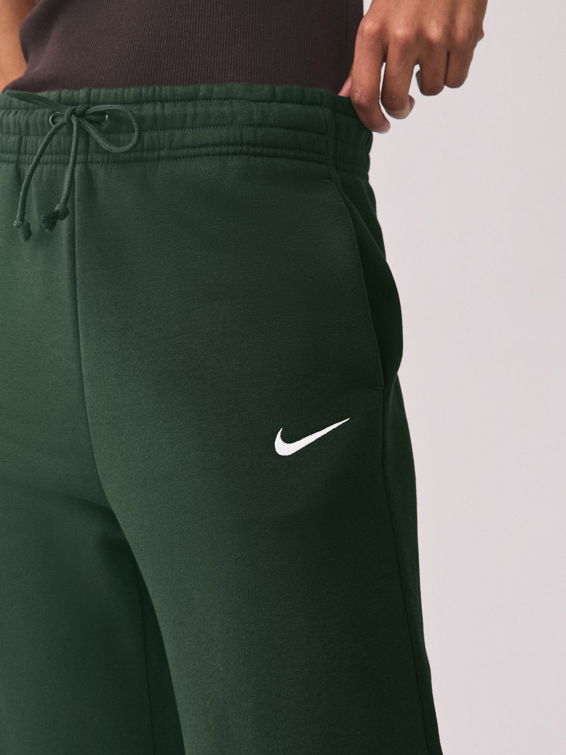 nike mini swoosh high waisted wide leg joggers in red