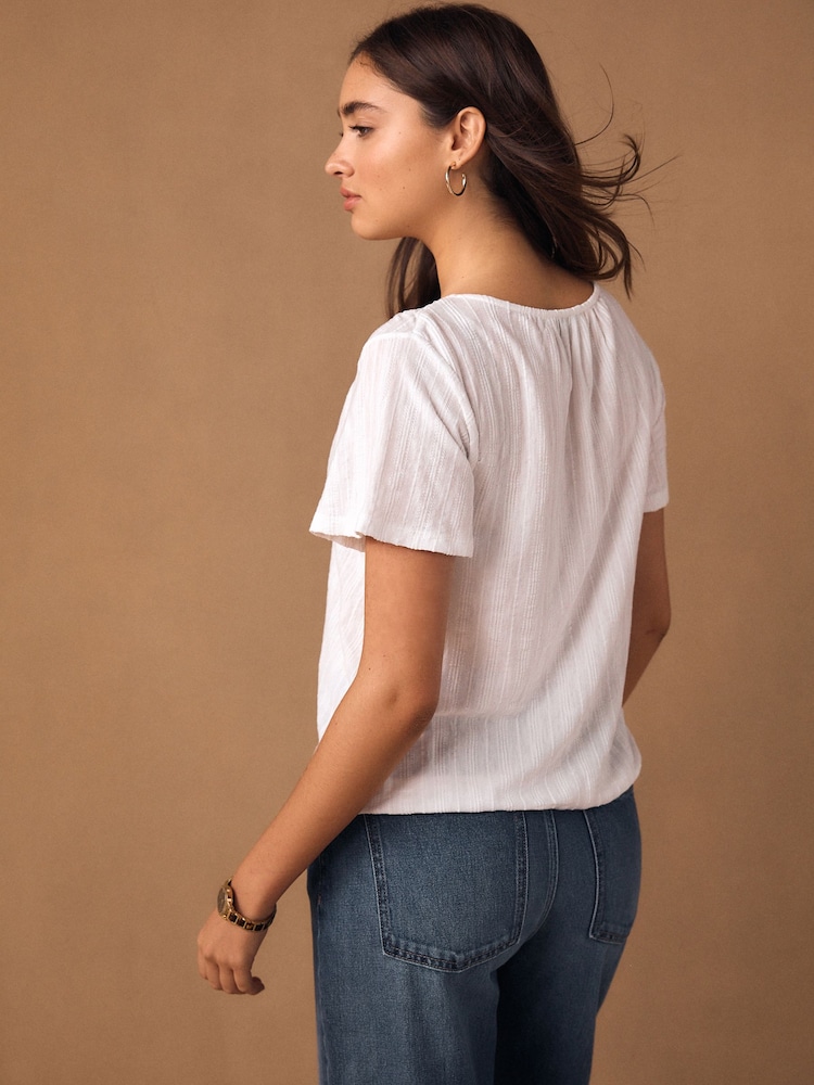 White Short Sleeve Notch Neck Shirred Bubblehem Top - Image 2 of 8