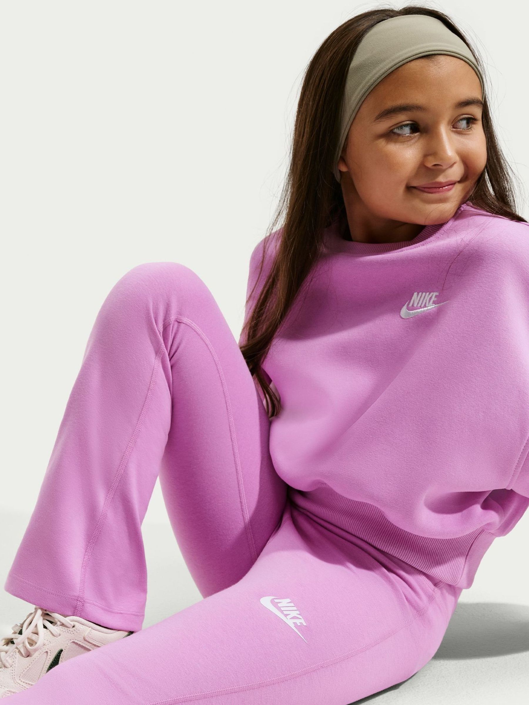 Buy Nike Magenta Pink High Waisted Flared Leggings from Next South Buy Nike Magenta Pink High Waisted Flared Leggings from Next South