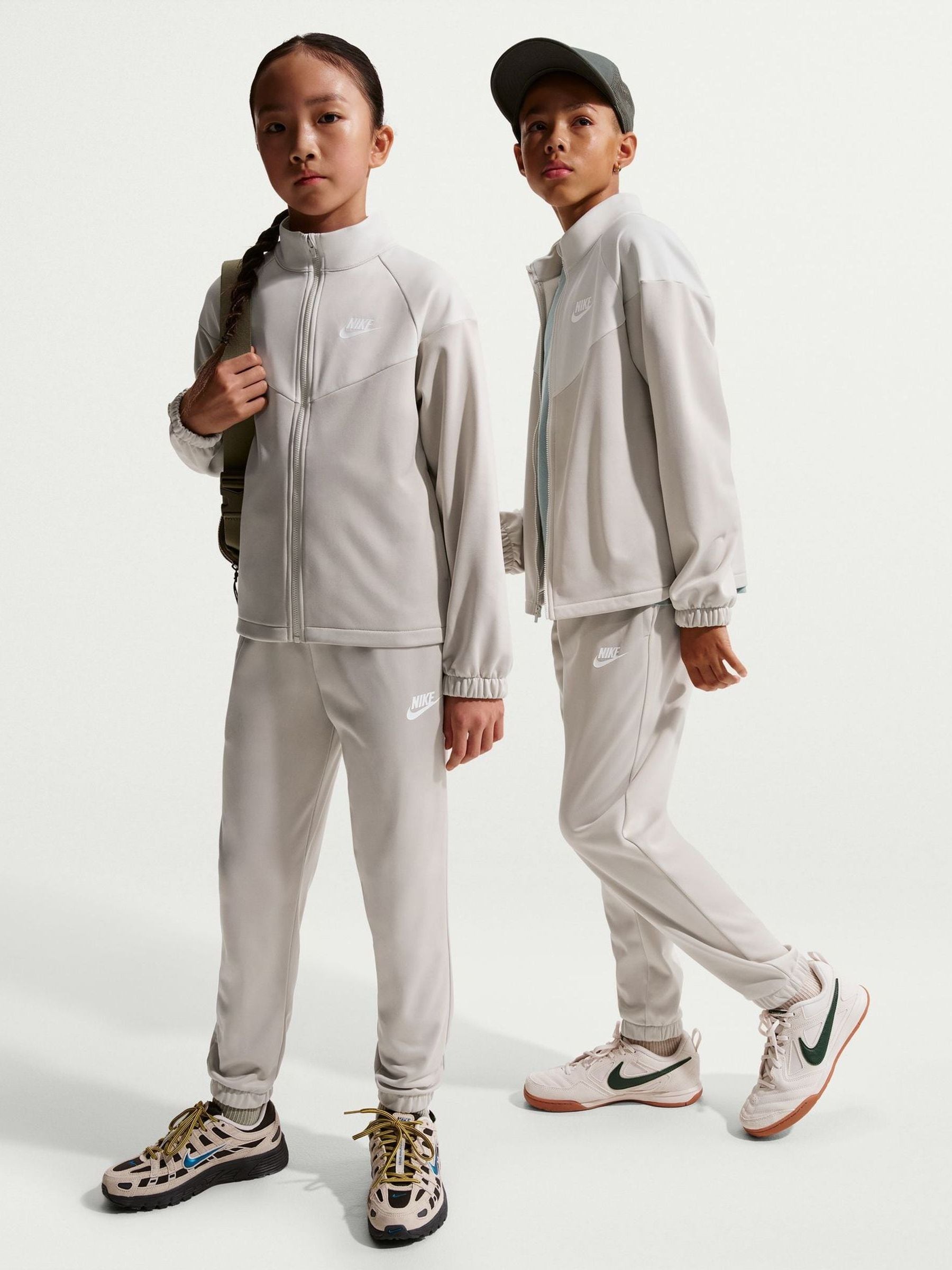 Buy Nike Neutral Dri-Fit Poly Zip Through Tracksuit from the Next