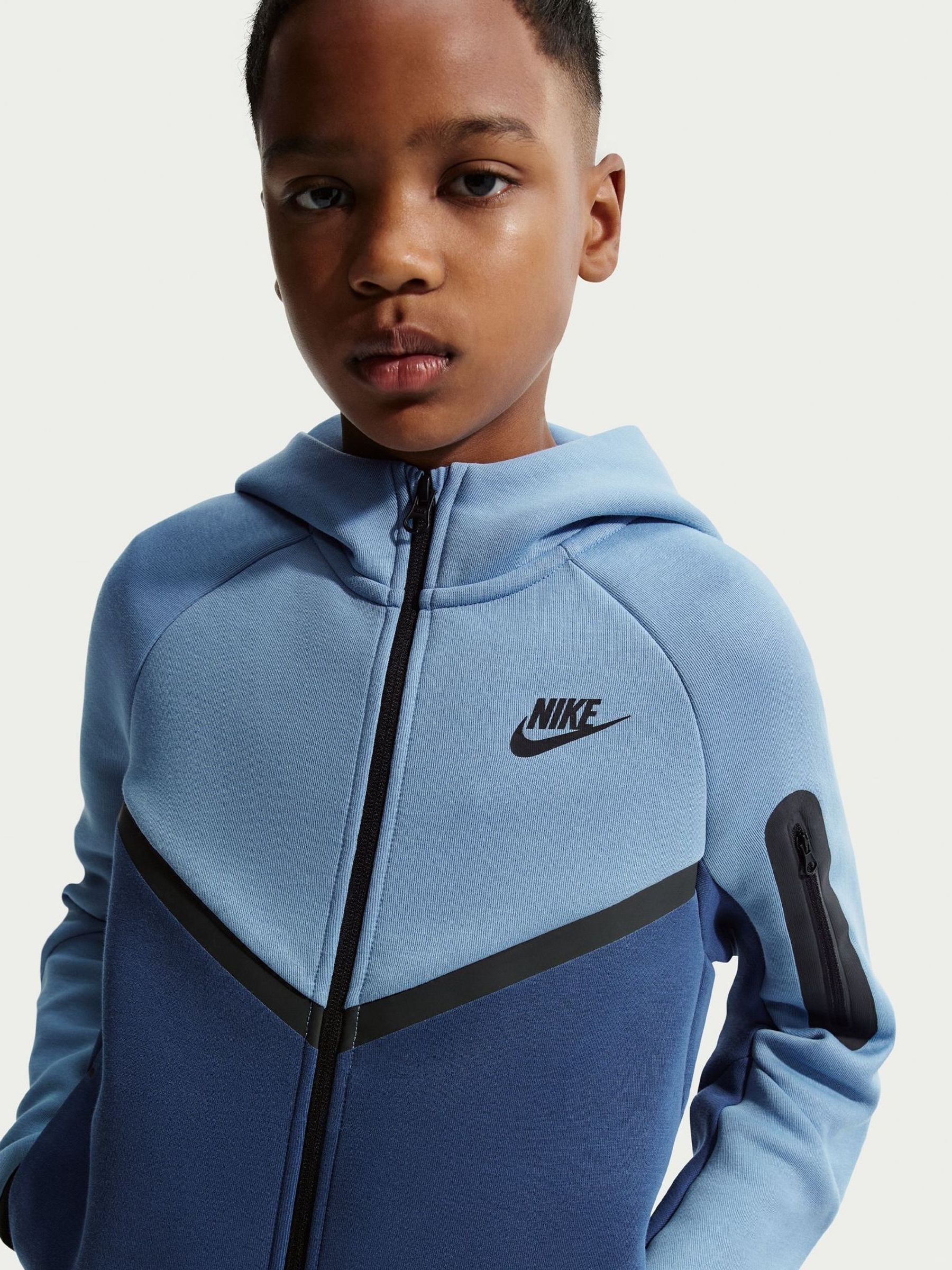 blue and black tech fleece hoodie