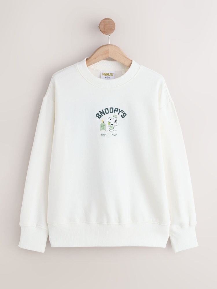 Ecru Snoopy Coffee Shop Graphic Long Sleeve Sweat Top - Image 1 of 4 Ecru Snoopy Coffee Shop Graphic Long Sleeve Sweat Top - Image 1 of 4
