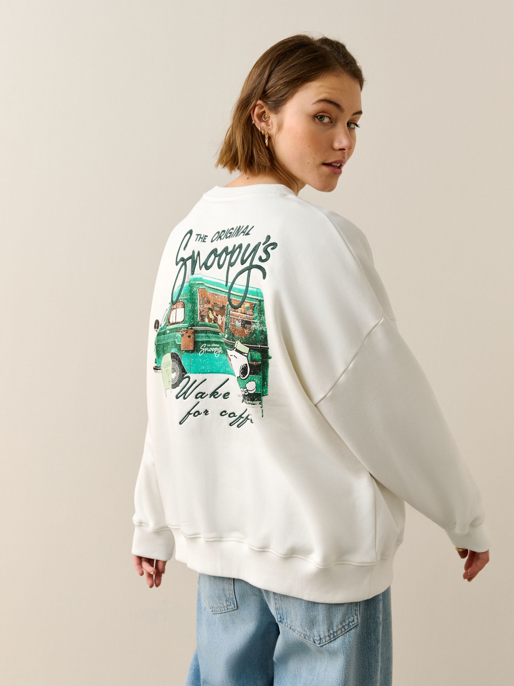 Buy Ecru Snoopy Coffee Shop Graphic Long Sleeve Sweat Top from