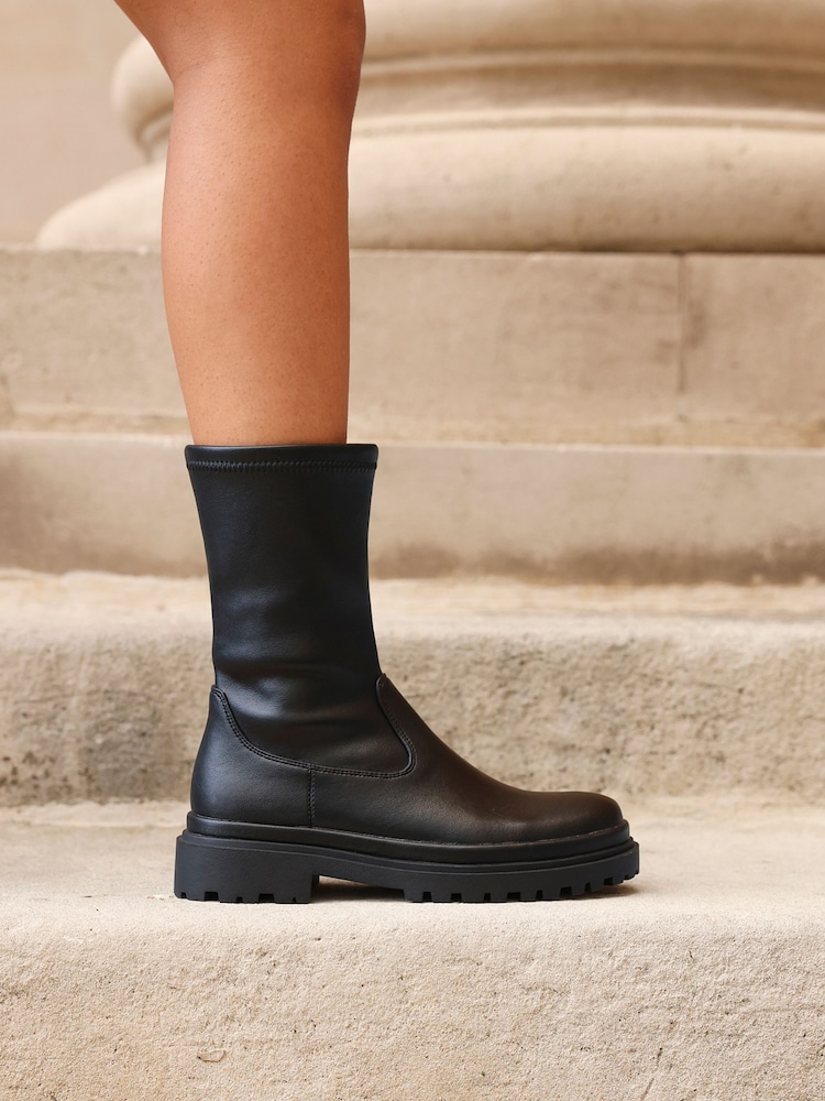 Linzi Black Edge Stretch Ankle Boots - Image 1 of 6 Linzi Black Edge Stretch Ankle Boots - Image 1 of 6