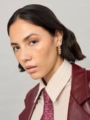 Aela Gold Tone Sphere Hoop Earrings - Image 1 of 3