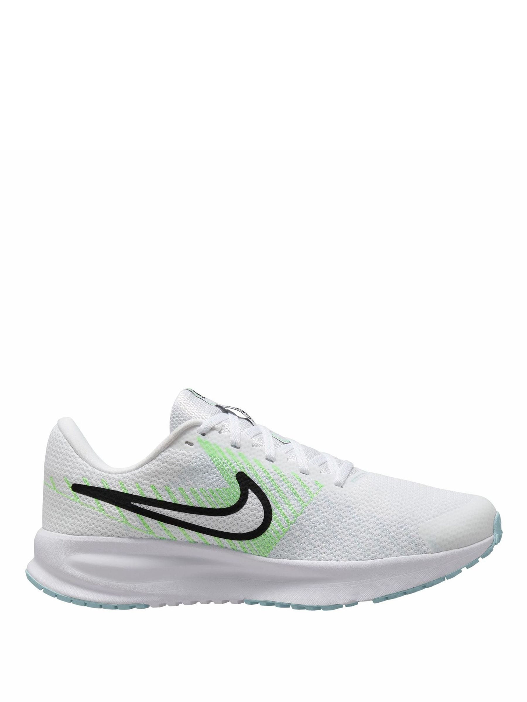 nike green and white trainers