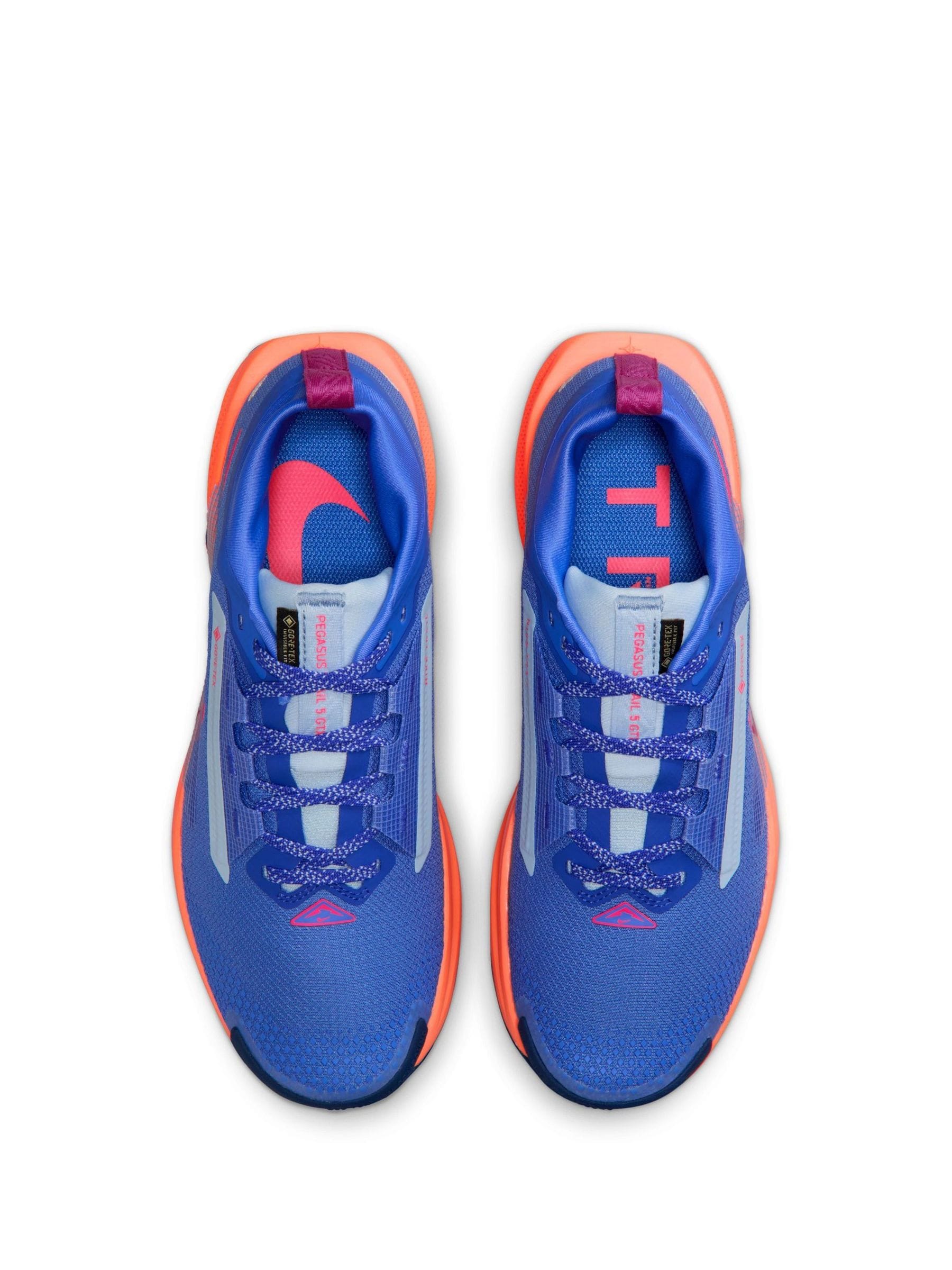 all blue nike shoes womens