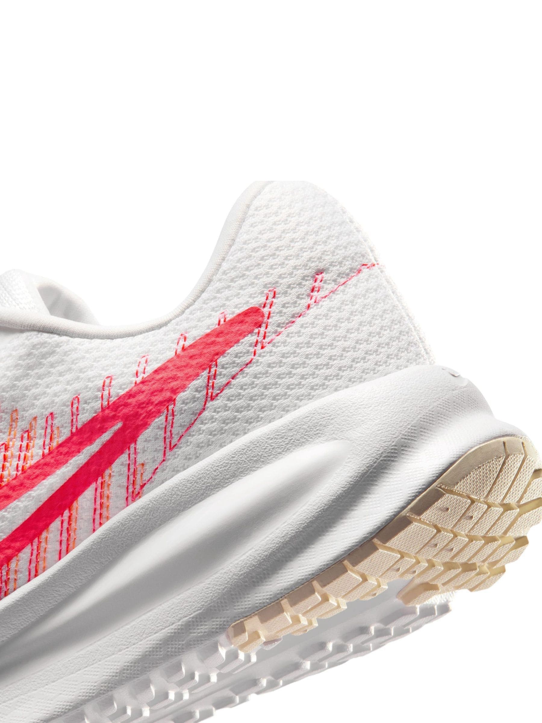 Comprar Branco/Laranja - Tênis de corrida Nike Run Defy para