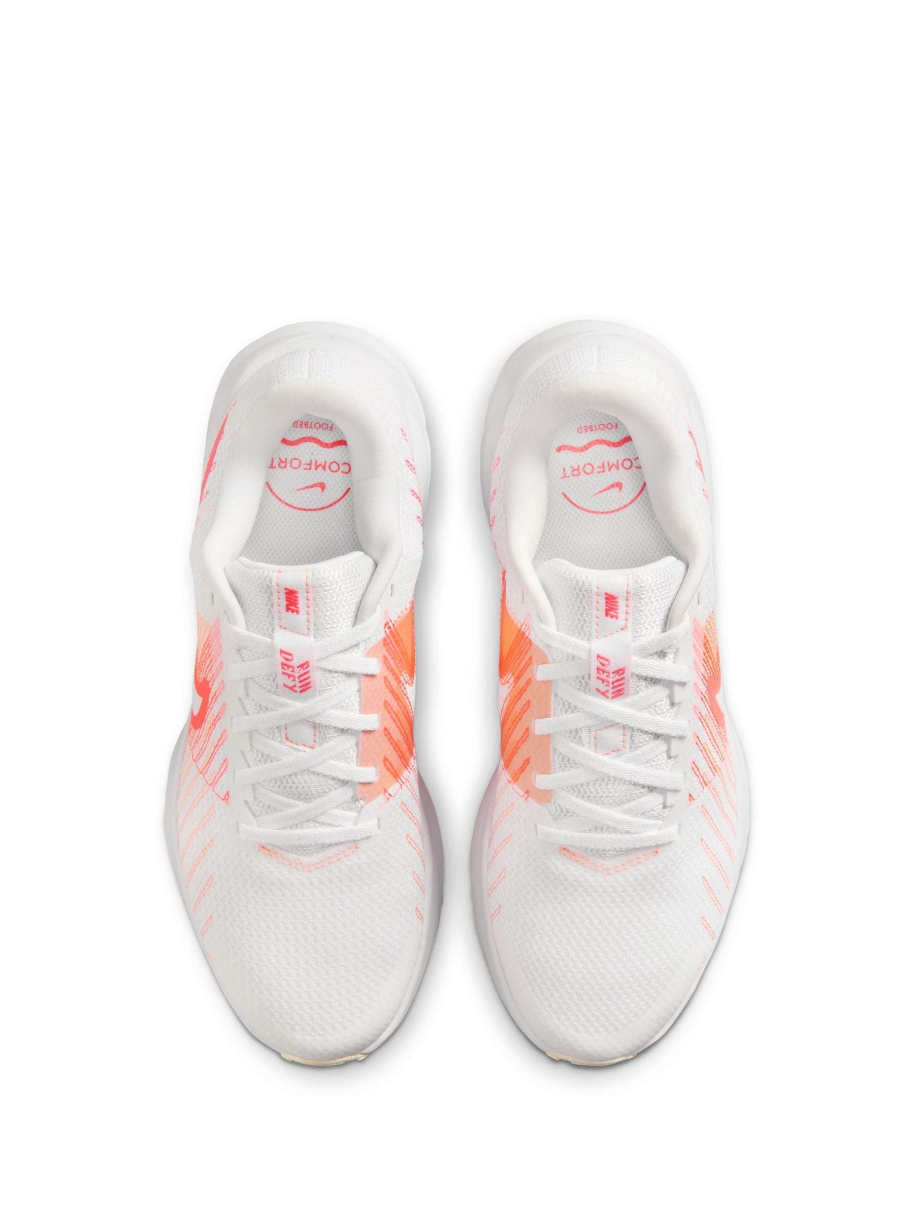 nike white orange sports shoes