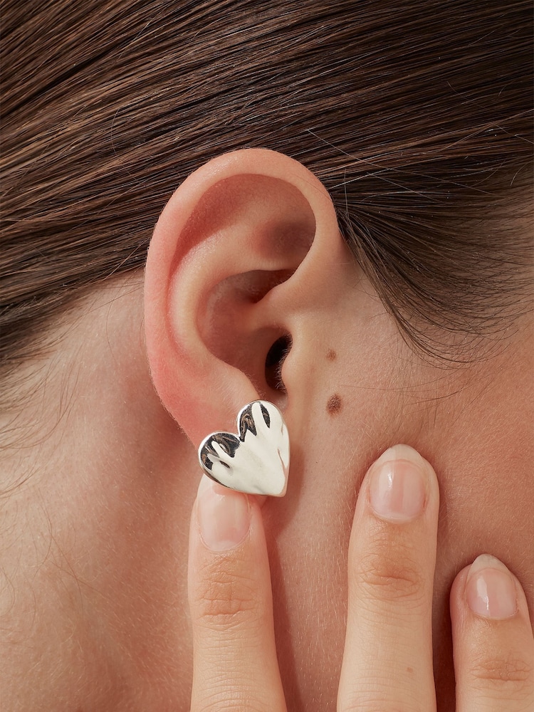 Estella Bartlett Silver Tone Oversized Waterproof Molten Heart Studs Earrings - Image 2 of 4 Estella Bartlett Silver Tone Oversized Waterproof Molten Heart Studs Earrings - Image 2 of 4