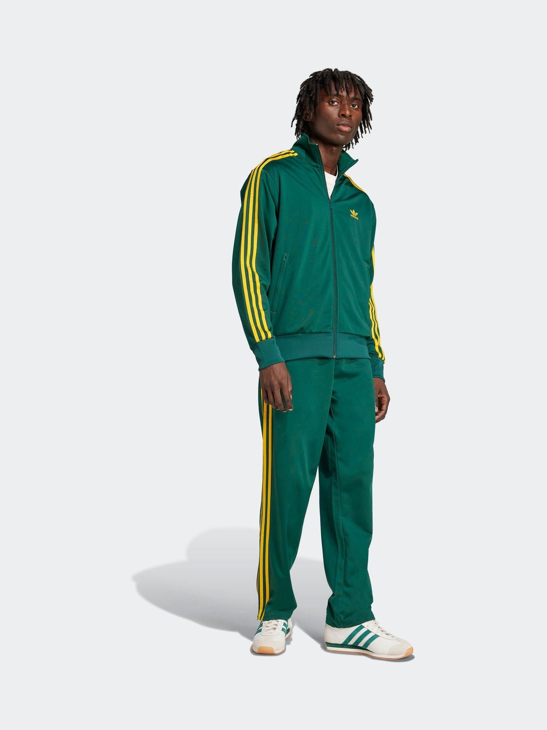 Buy adidas Originals Green Firebird Joggers from Next USA
