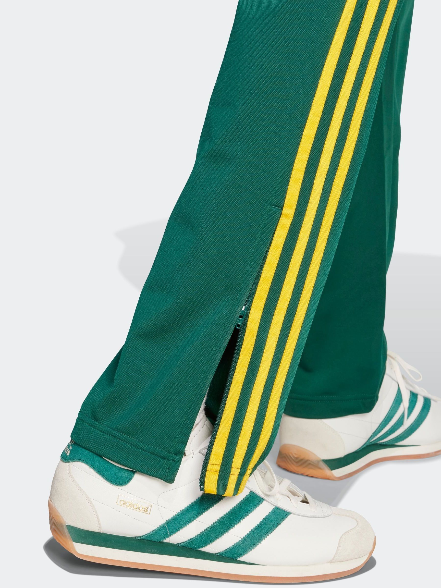 Buy adidas Originals Green Firebird Joggers from Next USA