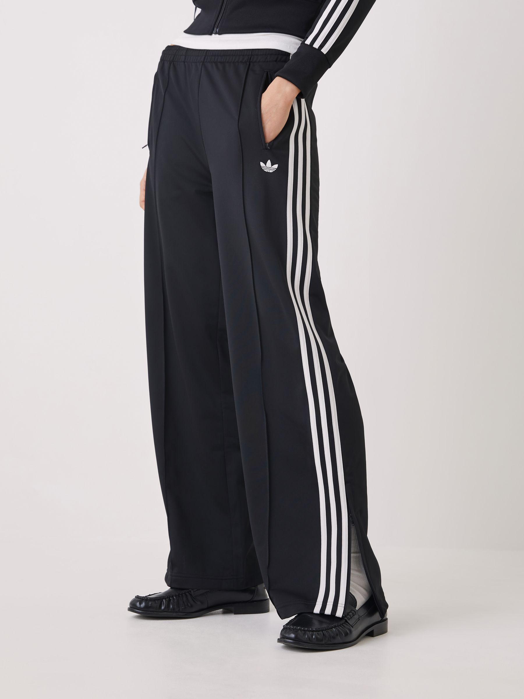 Buy adidas Originals Black Firebird Loose Trousers from Next USA