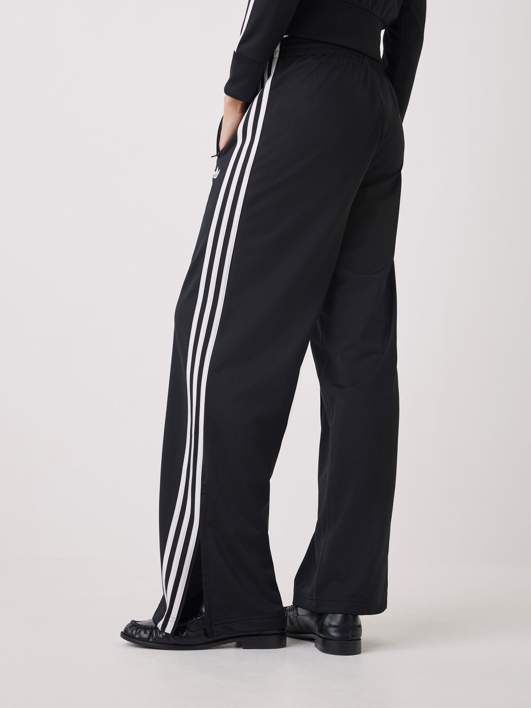 Buy adidas Originals Black Firebird Loose Trousers from Next USA