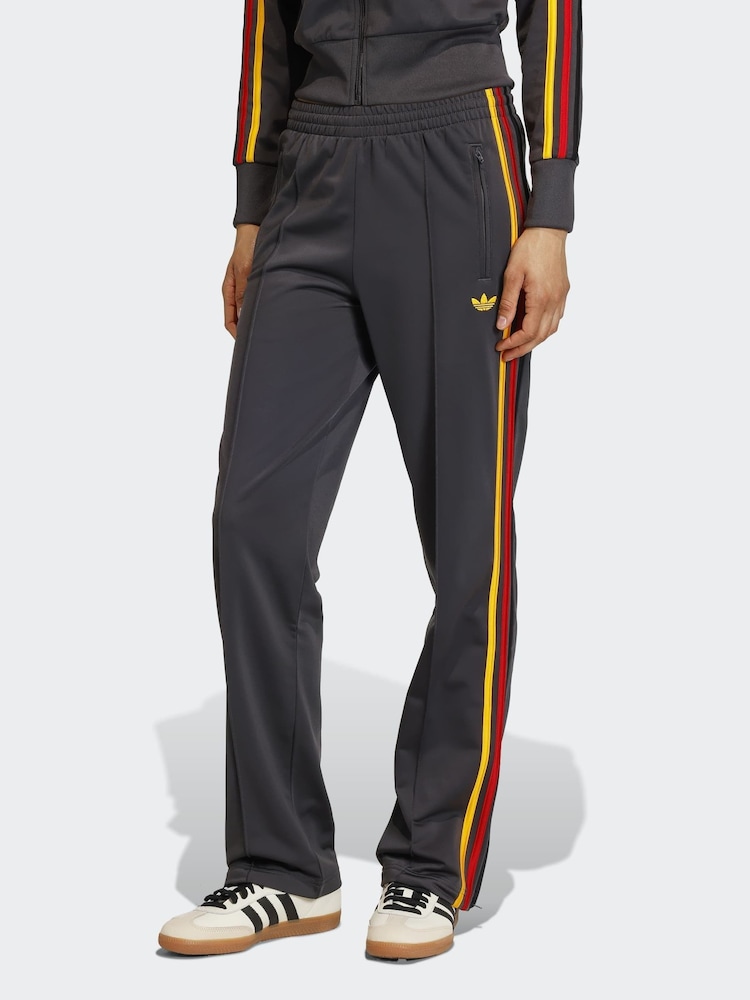 adidas Originals Black/Orange Firebird Classic Track Joggers - Image 1 of 6