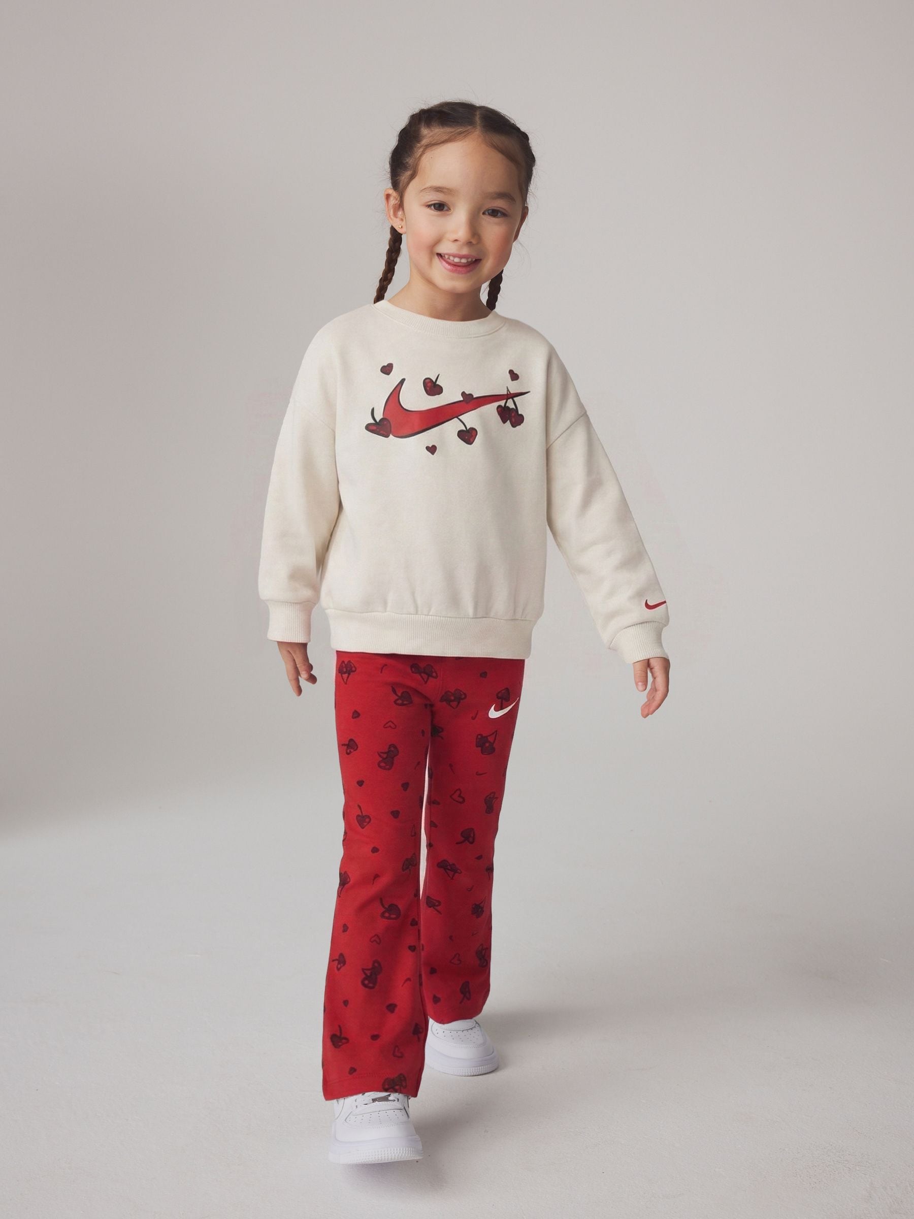 nike red swoosh joggers