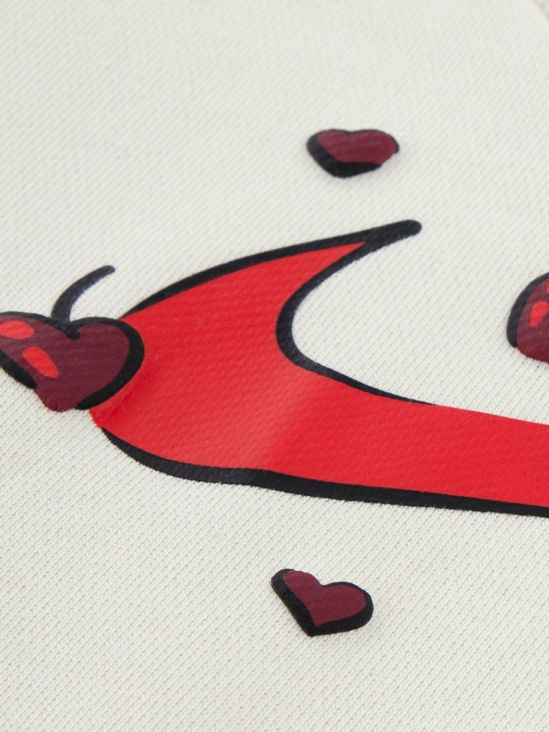 white and red nike joggers