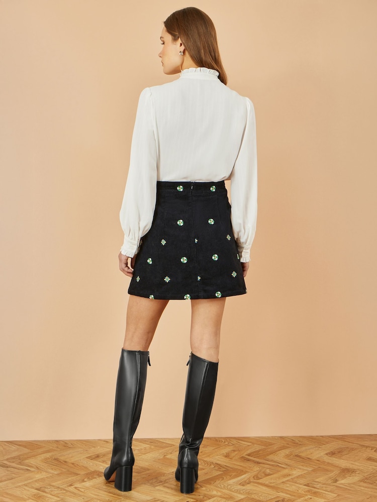 Yumi Black Flower Print Embroidered Cord Mini Skirt - Image 2 of 3 Yumi Black Flower Print Embroidered Cord Mini Skirt - Image 2 of 3