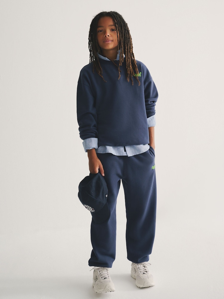 Superdry Blue/Yellow Hoodie & Jogger Set - Image 1 of 2 Superdry Blue/Yellow Hoodie & Jogger Set - Image 1 of 2