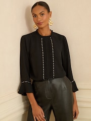 Love & Roses Black Heart Hardware Detail Flute Sleeve Blouse - Image 1 of 4