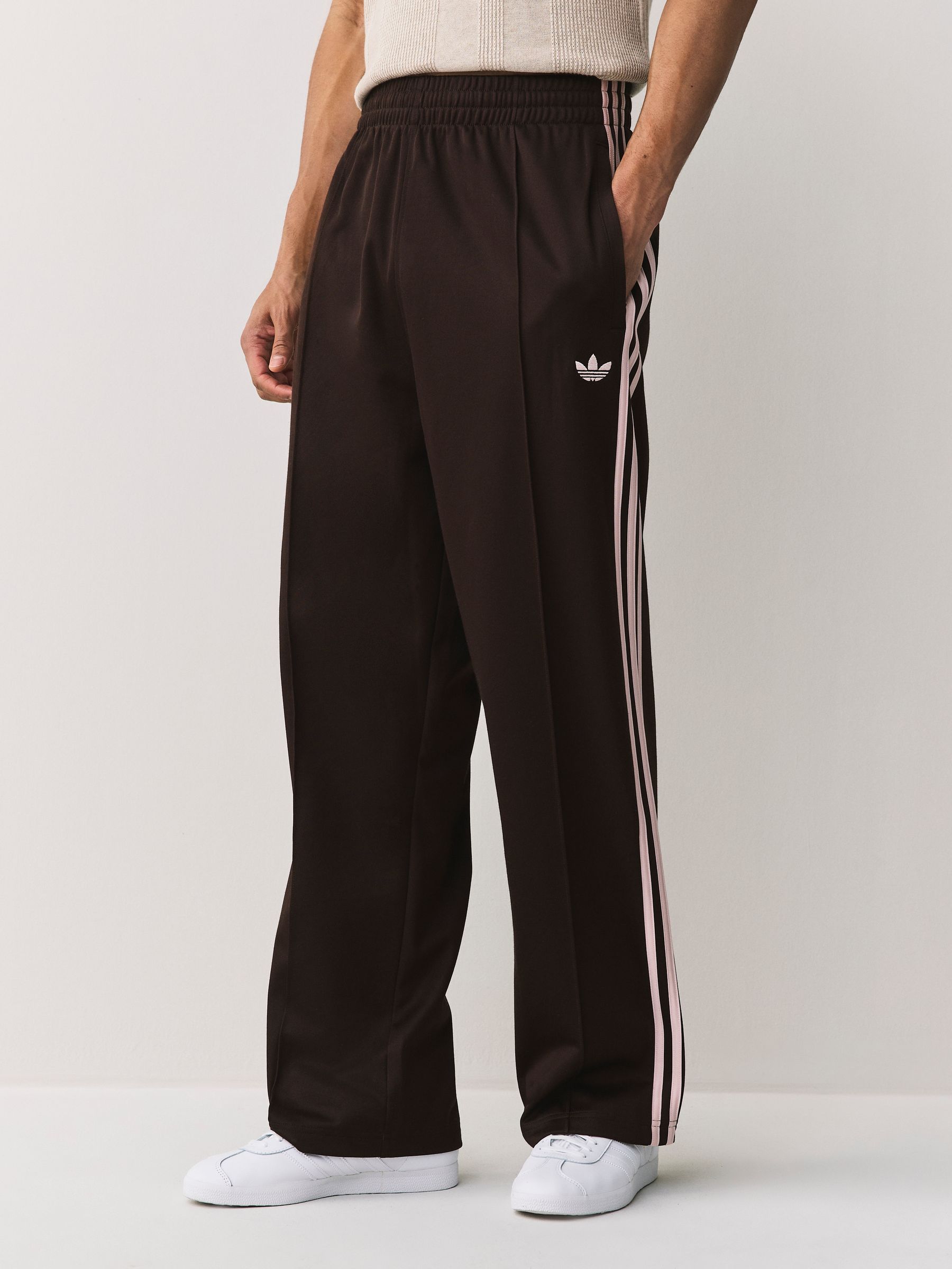 Buy adidas Originals Brown Baggy Track Joggers from Next USA