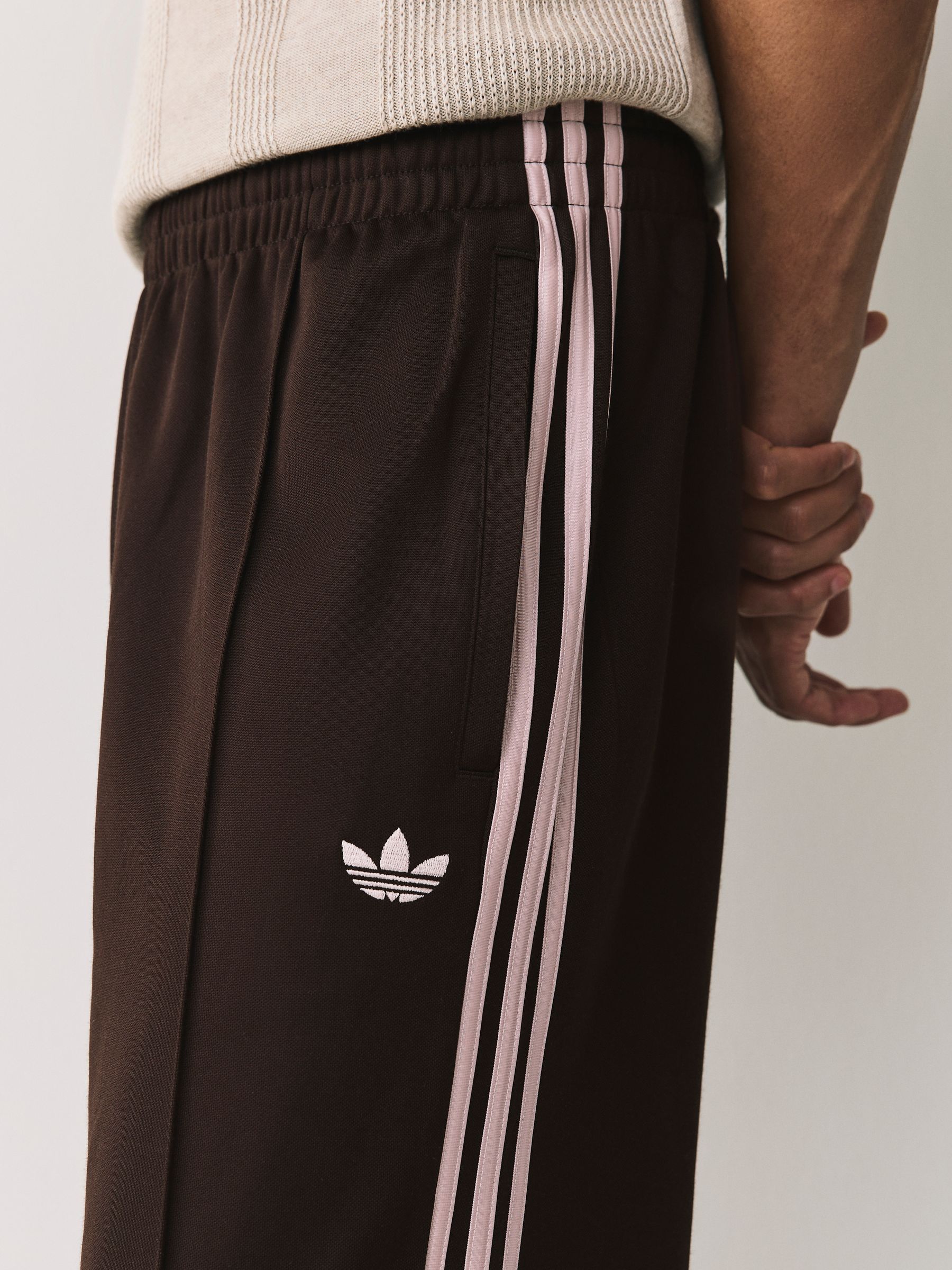 Buy adidas Originals Brown Baggy Track Joggers from Next USA
