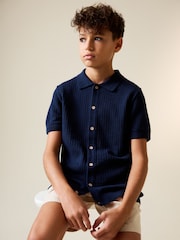 כחול כהה - חולצת פולו מכופתרת סרוגה (גיל 3 עד 16) - תמונה 1 מתוך 8