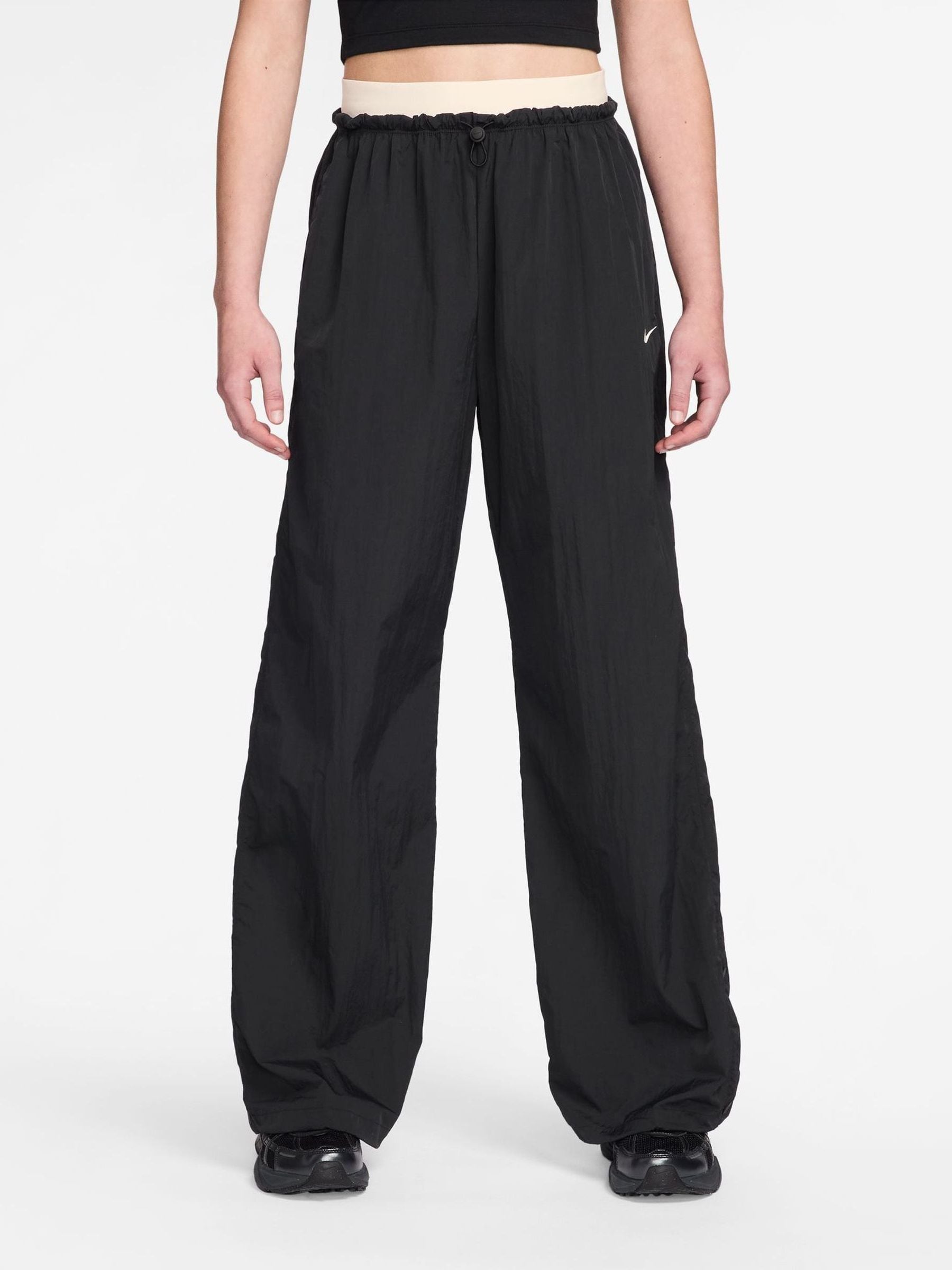 Buy Nike Black Adjustable Parachute Trousers from the Next UK