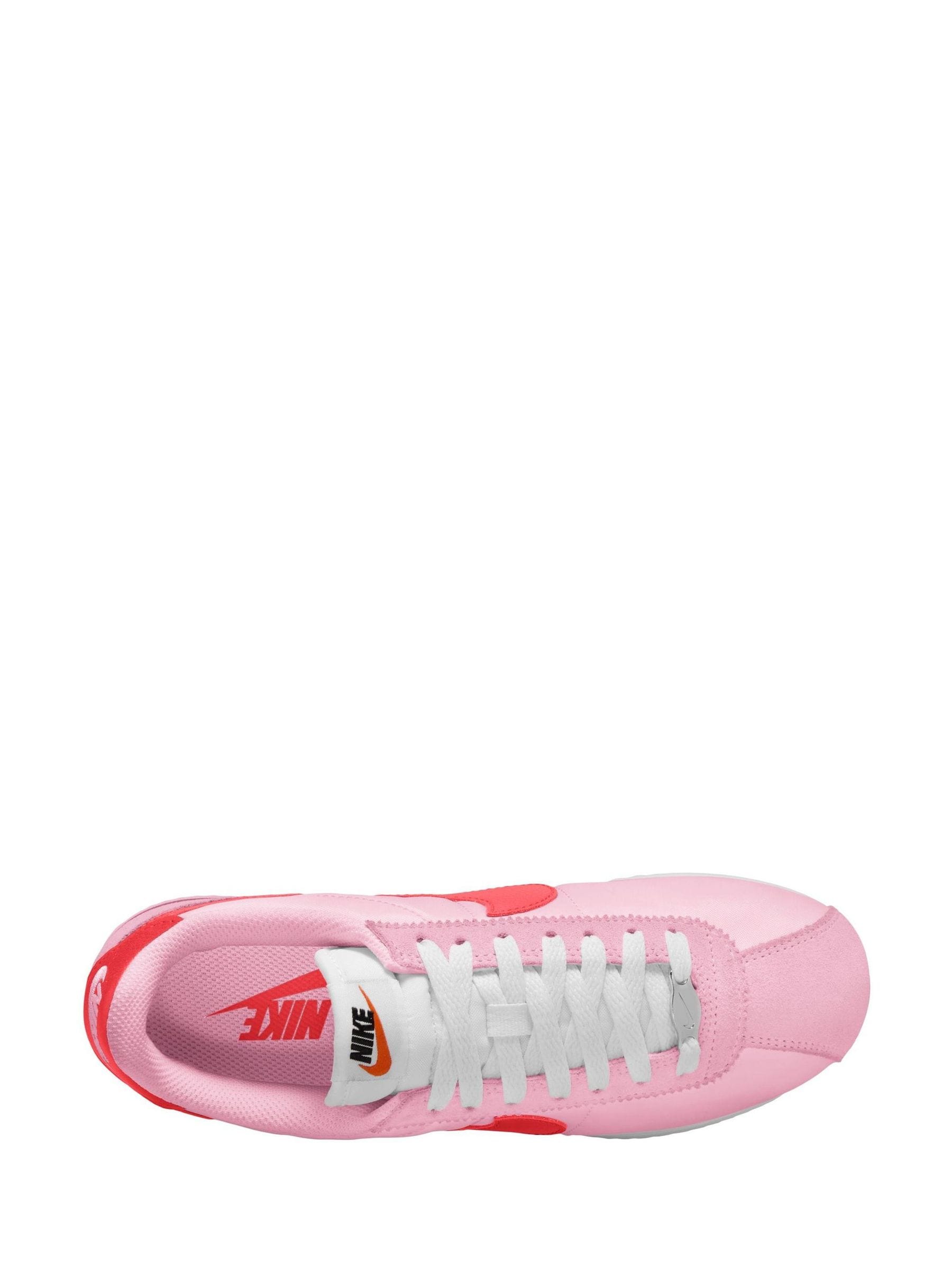 pink and red nike cortez
