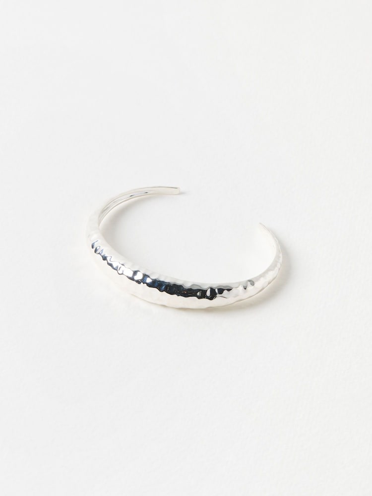Oliver Bonas Silver Tone Hallie Hammered Bangle - Image 1 of 3