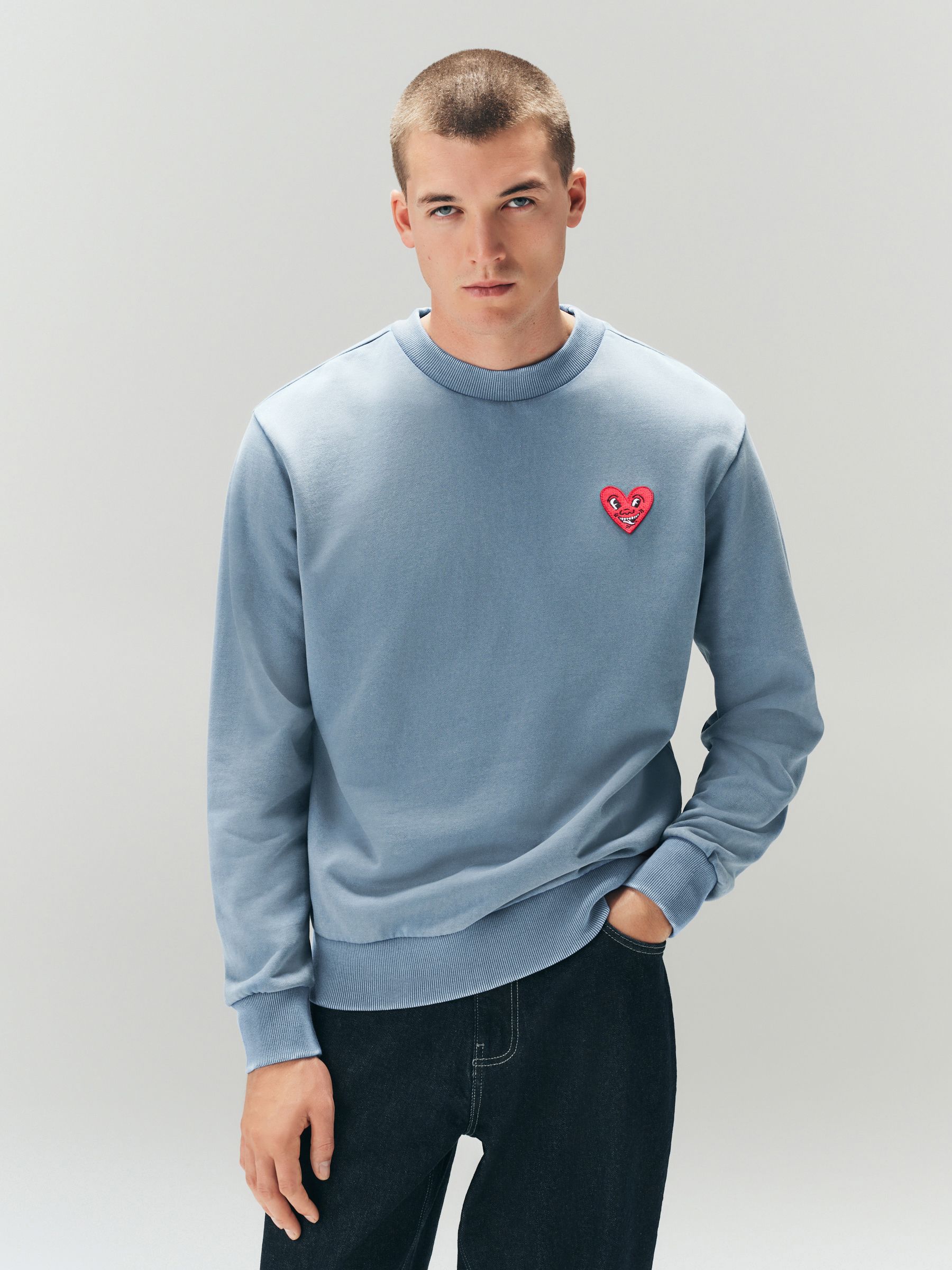Buy Blue Keith Haring Graphic Crew Neck Sweatshirt from Next Ireland