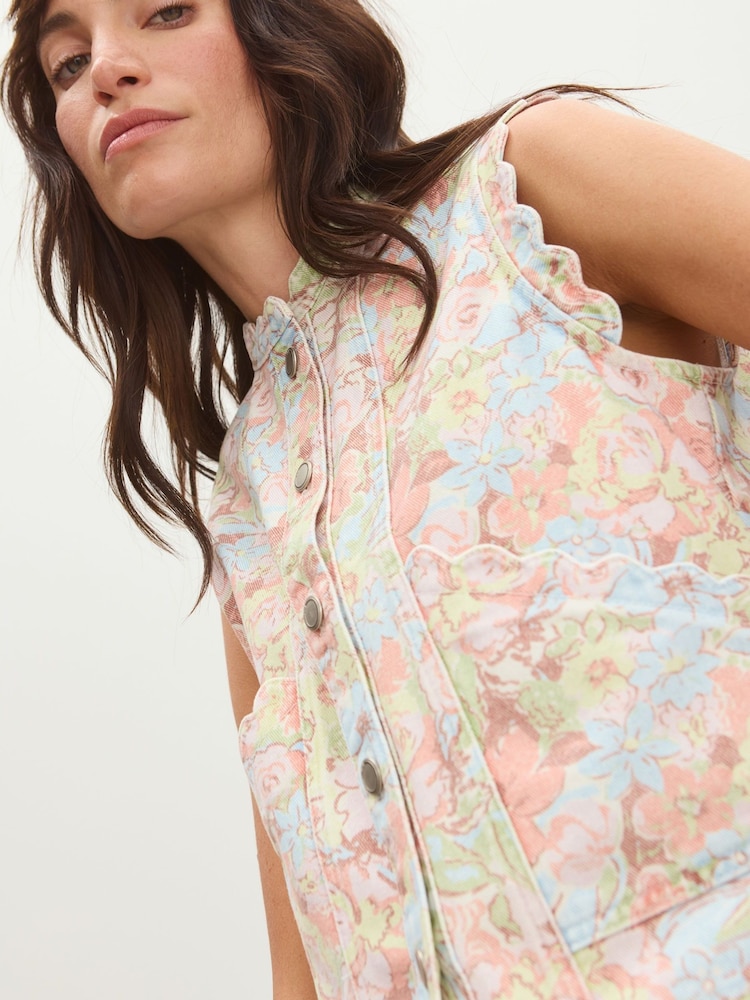 Oliver Bonas Pink Pastel Floral Print Scalloped Denim Waistcoat - Image 1 of 8 Oliver Bonas Pink Pastel Floral Print Scalloped Denim Waistcoat - Image 1 of 8