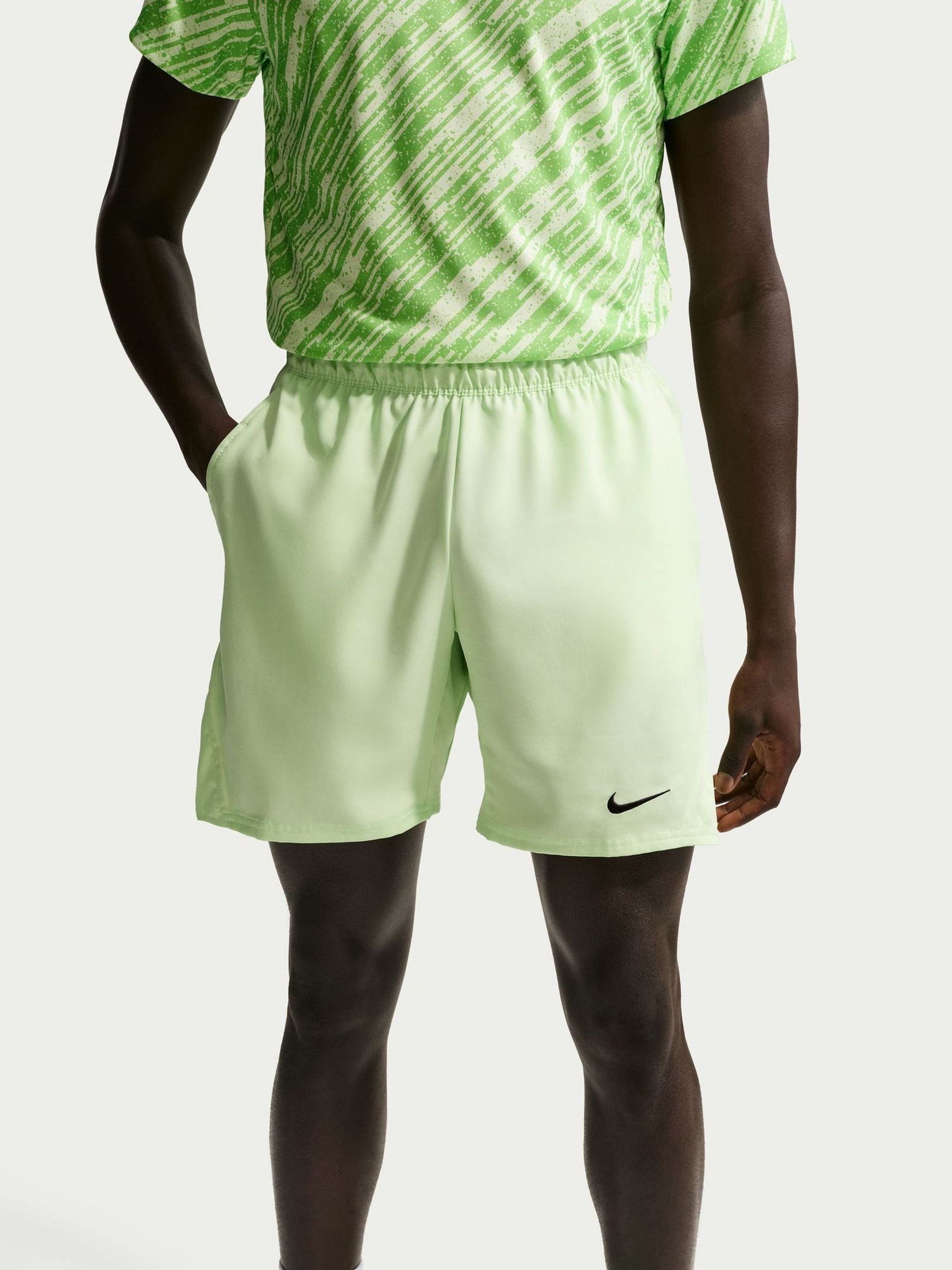 green nike tennis shorts