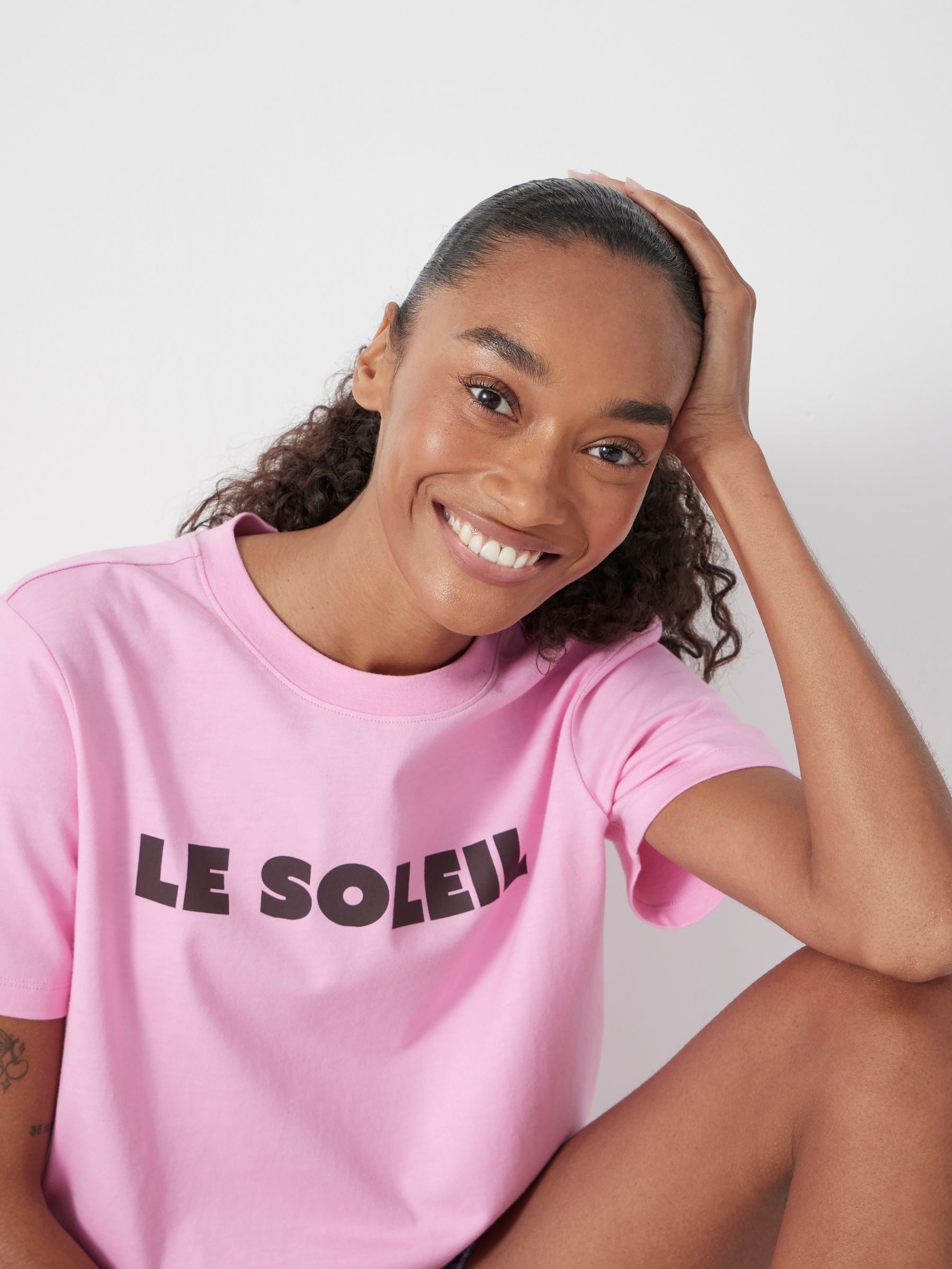 Buy Hush Pink Le Soleil Slogan T-Shirt from the Next UK online shop