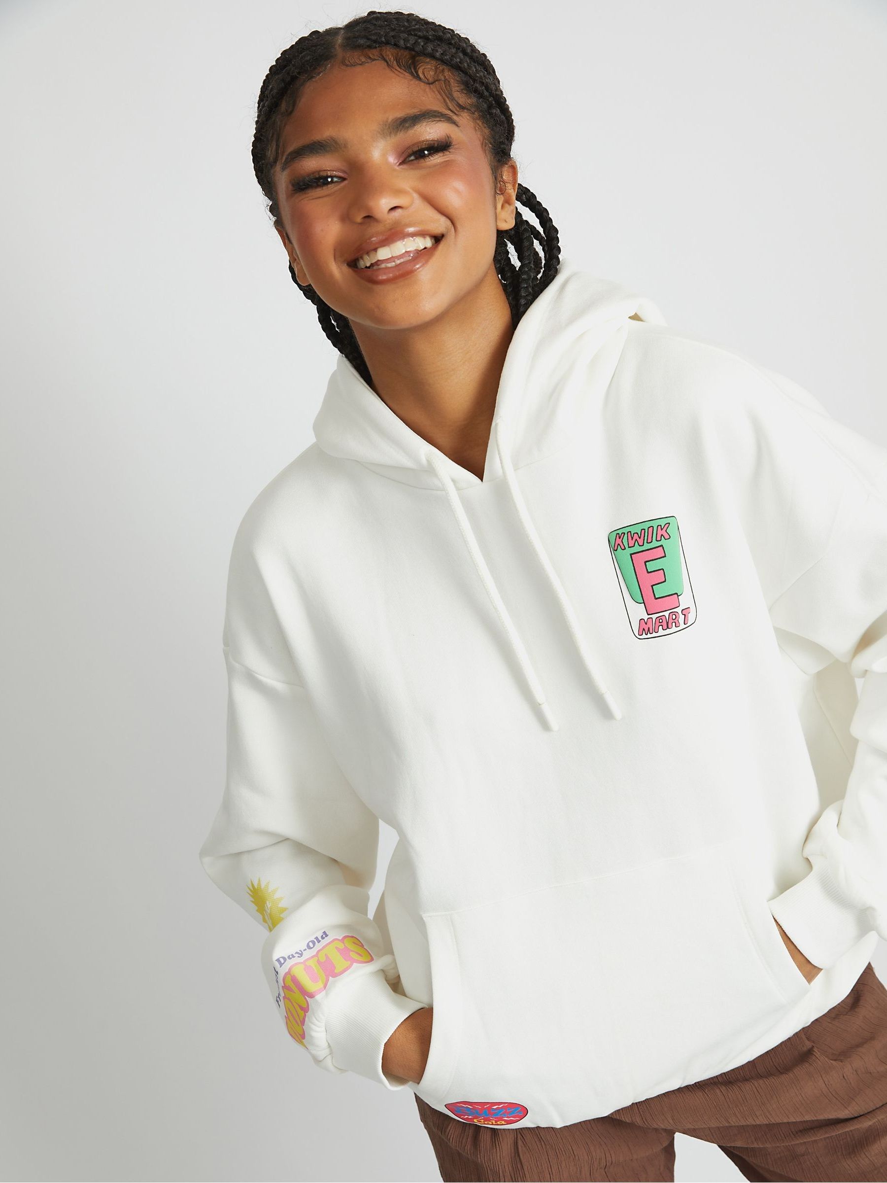 Buy Skinnydip White The Simpsons x Kwik-E-Mart Hoodie from Next USA