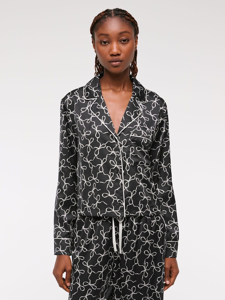 Abercrombie & Fitch Bow Print Button Through Black Pyjamas Top - Image 1 of 1