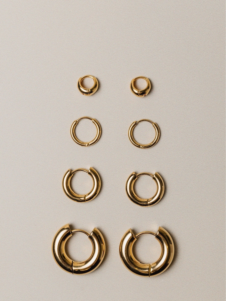Orelia Luxe Gold Tone Huggie Hoop Earrings - Image 1 of 1