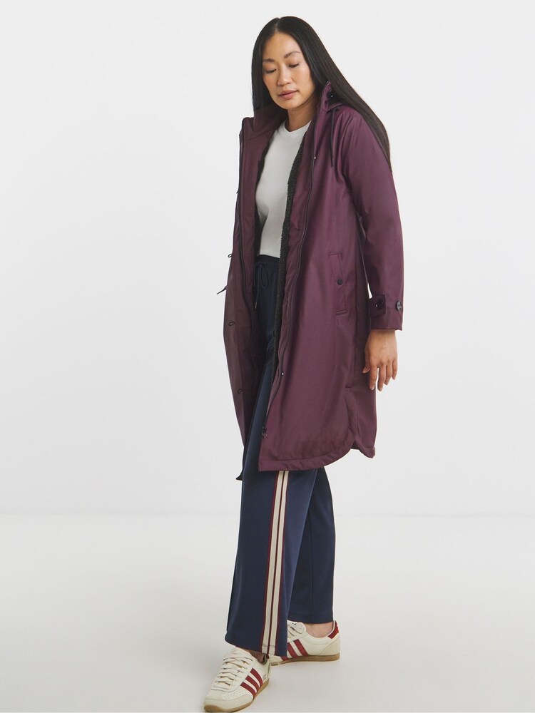 JD Williams Purple Fleece Lined Rubberised Raincoat With Hood - Image 1 of 4 JD Williams Purple Fleece Lined Rubberised Raincoat With Hood - Image 1 of 4