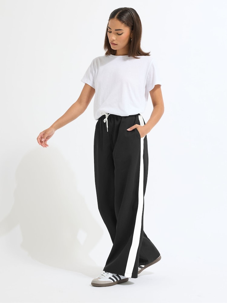 PixieGirl Petite Black Side Stripe Wide Leg Trousers - Image 1 of 5 PixieGirl Petite Black Side Stripe Wide Leg Trousers - Image 1 of 5