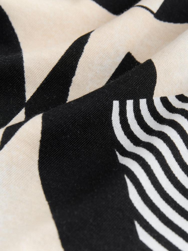 أسود/أبيض رسم - تيشِرت أساسي من القطن الخالص بكُم قصير وحافة رقبة مستديرة - صورة 6 من 6