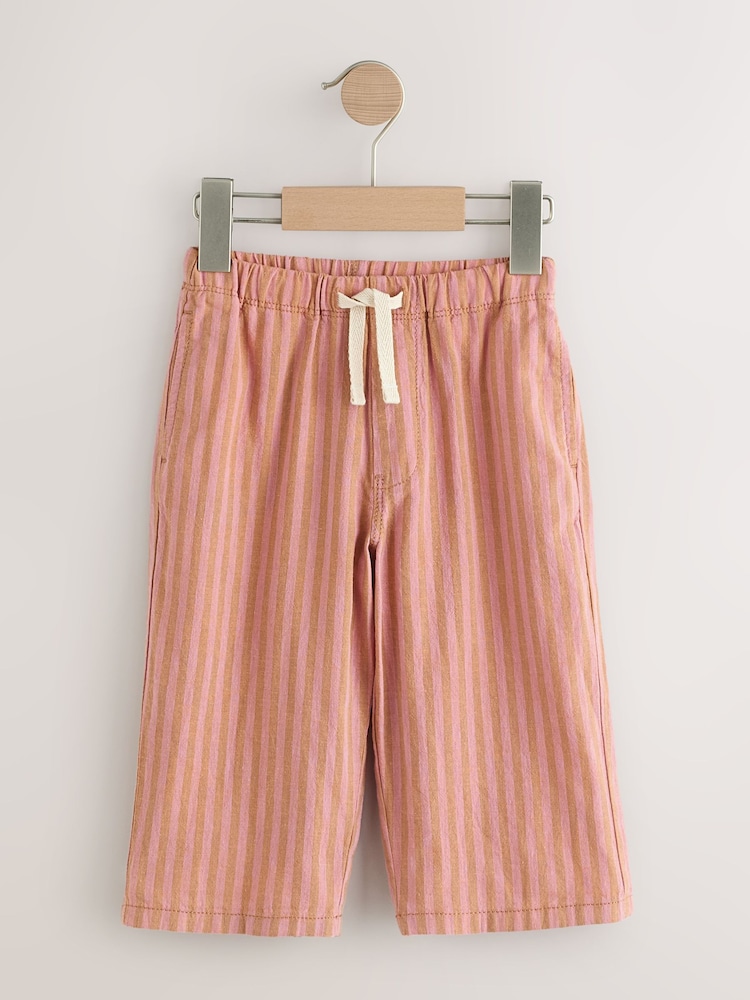 أحمر مقلم - بنطلون سهل اللبس برِجل واسعة من مزيج كتّان (3 أشهر - 7 سنوات) - صورة 1 من 4 أحمر مقلم - بنطلون سهل اللبس برِجل واسعة من مزيج كتّان (3 أشهر - 7 سنوات) - صورة 1 من 4