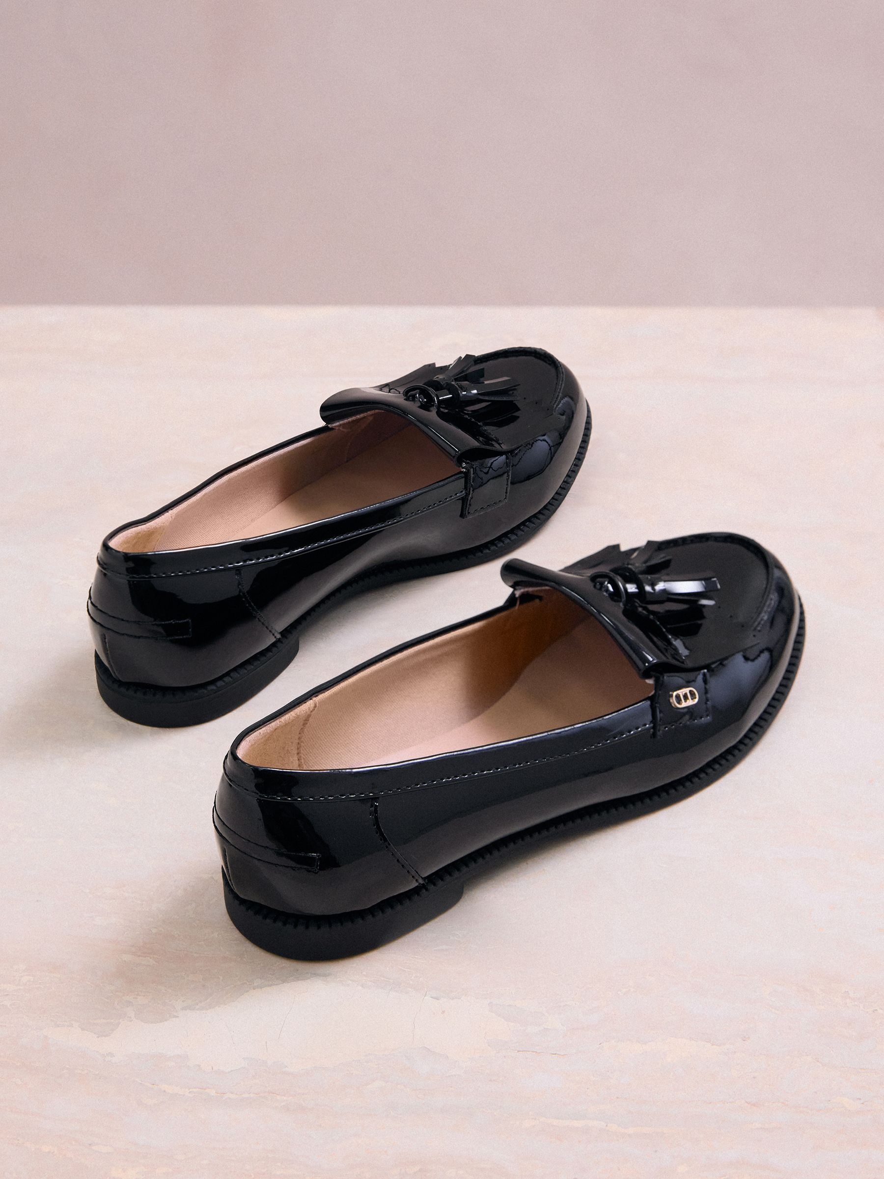 Buy Lipsy Black Standard Fit Patent Flat Tassle Workwear Loafers