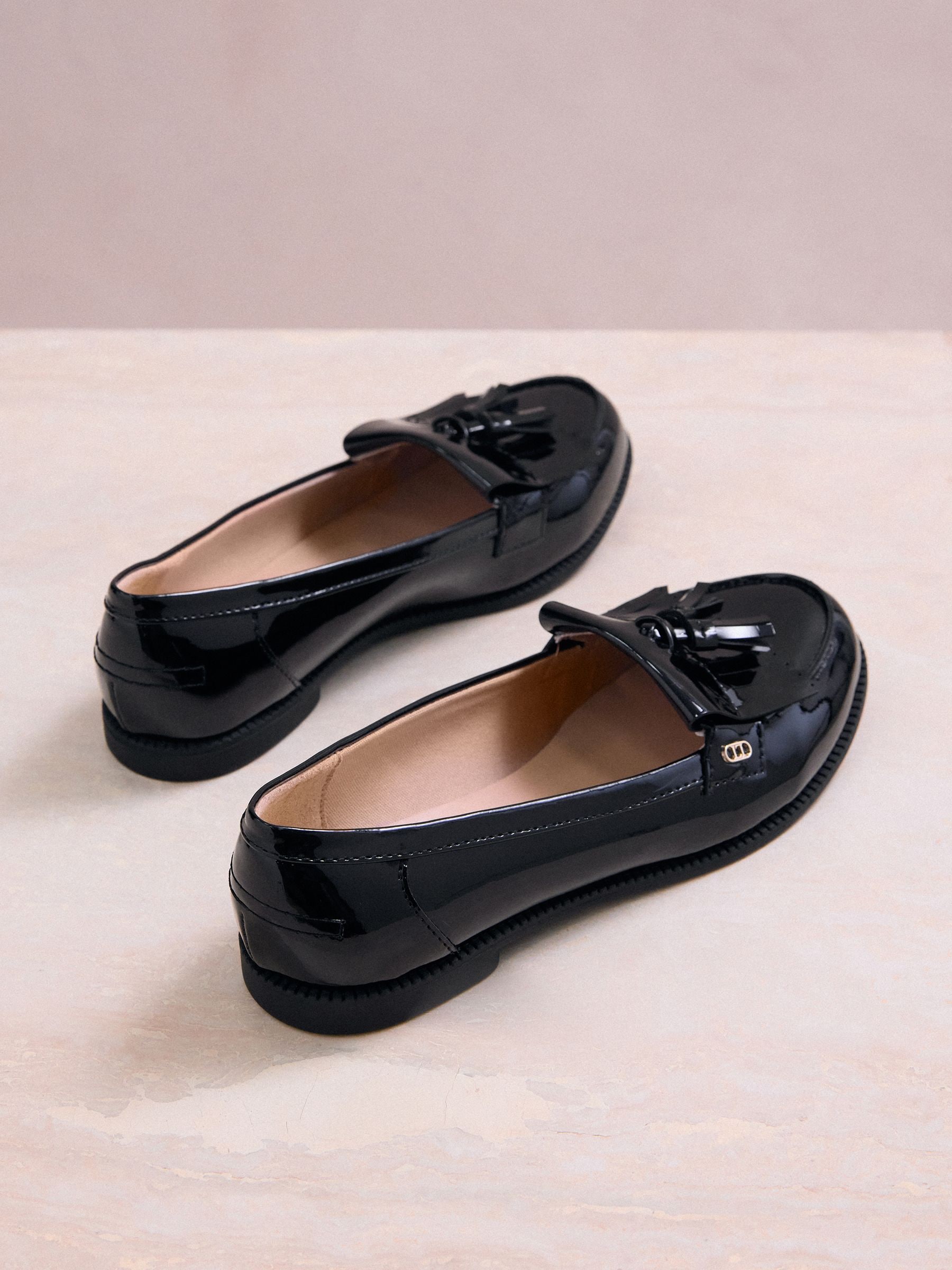 Buy Lipsy Black Wide Fit Patent Flat Tassle Workwear Loafers from