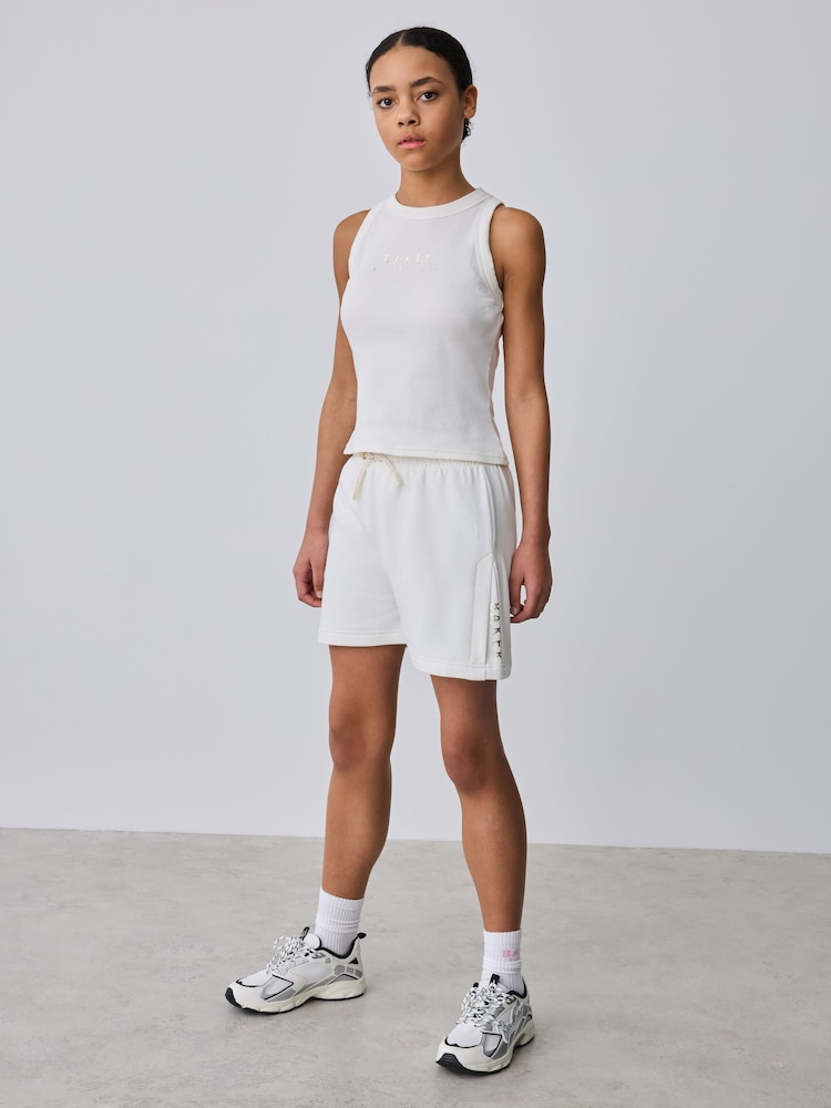 طقم 2 قطعة من صديري بحمَّالات متصلة وشورت رياضي من Baker by Ted Baker - صورة 1 من 14 طقم 2 قطعة من صديري بحمَّالات متصلة وشورت رياضي من Baker by Ted Baker - صورة 1 من 14