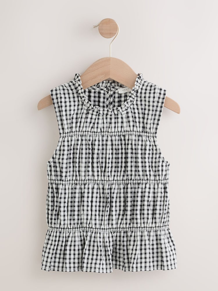 Monochrome Shirred Sleeveless Blouse (3-16yrs) - Image 1 of 5 Monochrome Shirred Sleeveless Blouse (3-16yrs) - Image 1 of 5