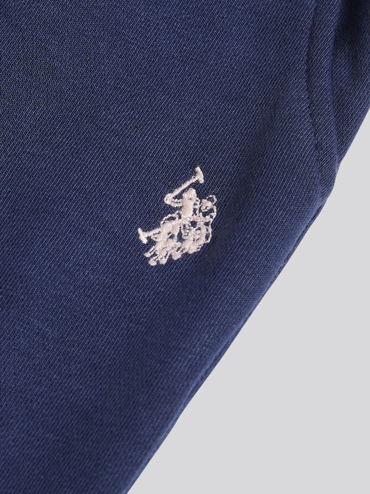 أزرق - بنطلون رياضي نسائي بحافة مطوية مزين برسمة فارسين من U.S. Polo Assn. - صورة 7 من 7 أزرق - بنطلون رياضي نسائي بحافة مطوية مزين برسمة فارسين من U.S. Polo Assn. - صورة 7 من 7