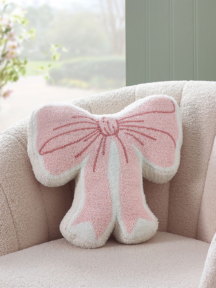 Catherine Lansfield Pink Bow Boucle 3D Shaped Cushion - Image 1 of 2 Catherine Lansfield Pink Bow Boucle 3D Shaped Cushion - Image 1 of 2