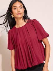 Friends Like These Raspberry Pink Short Sleeve Bubble Hem Pleated Blouse - Image 1 of 4