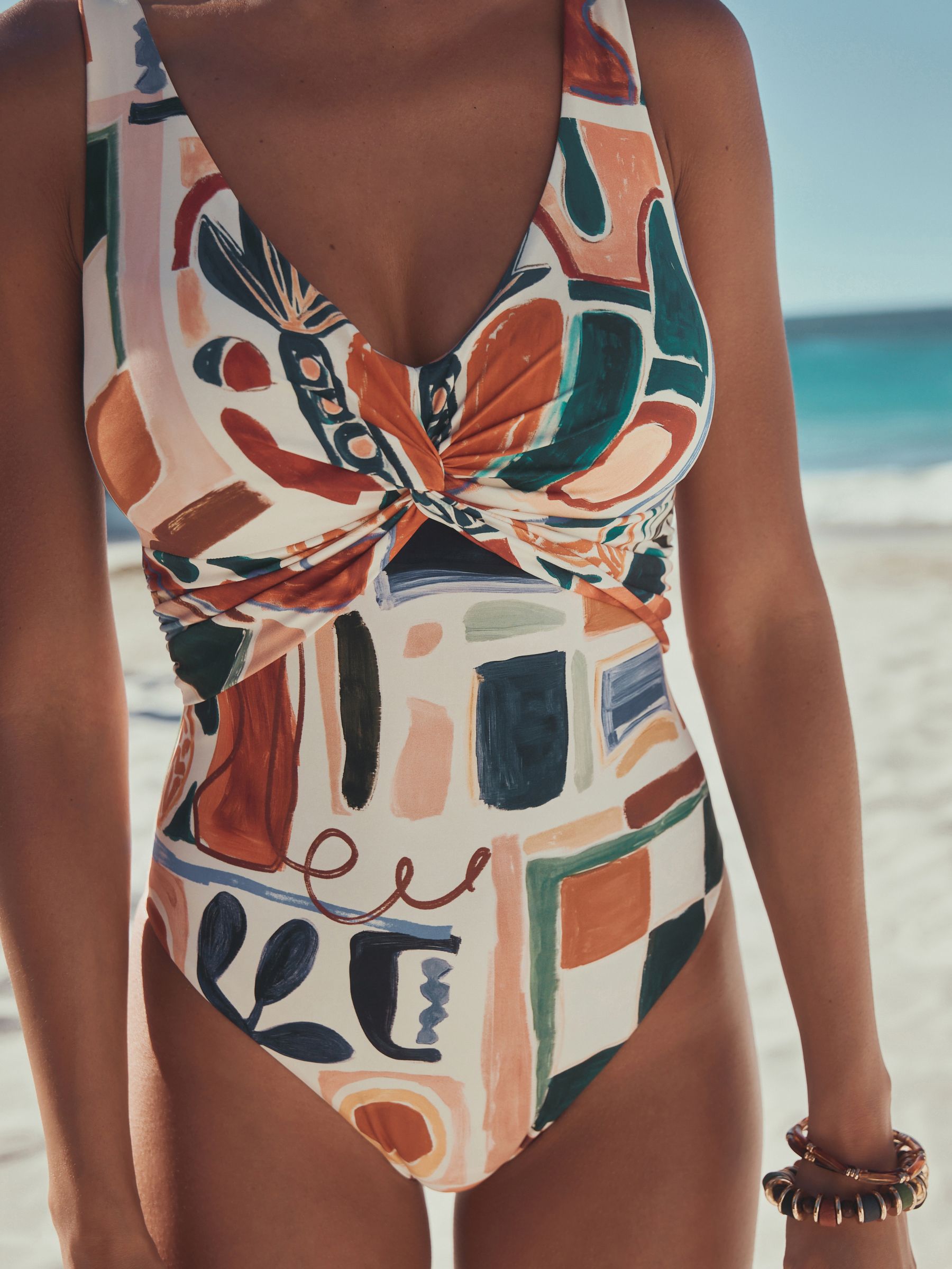 Buy Cream/Brown Abstract Plunge Tummy Control Swimsuit from Next USA