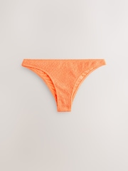 Klar orange skrynklor - Bikinitrosor med höga ben - Bild 1 av 3